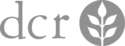 Gray logo with the letters "dcr" next to a circular emblem containing a stylized leaf.