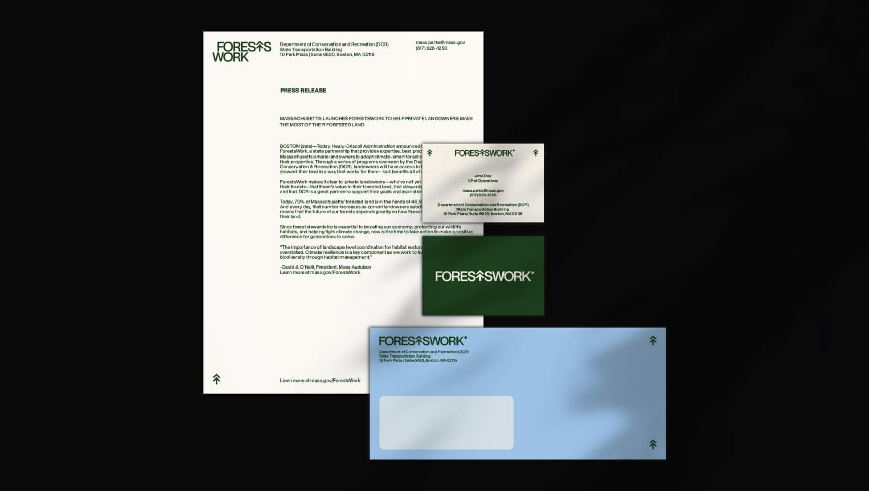 A collection of stationery items including a letterhead, business cards, and an envelope, all featuring the "FORESAWORK" branding in green and white.