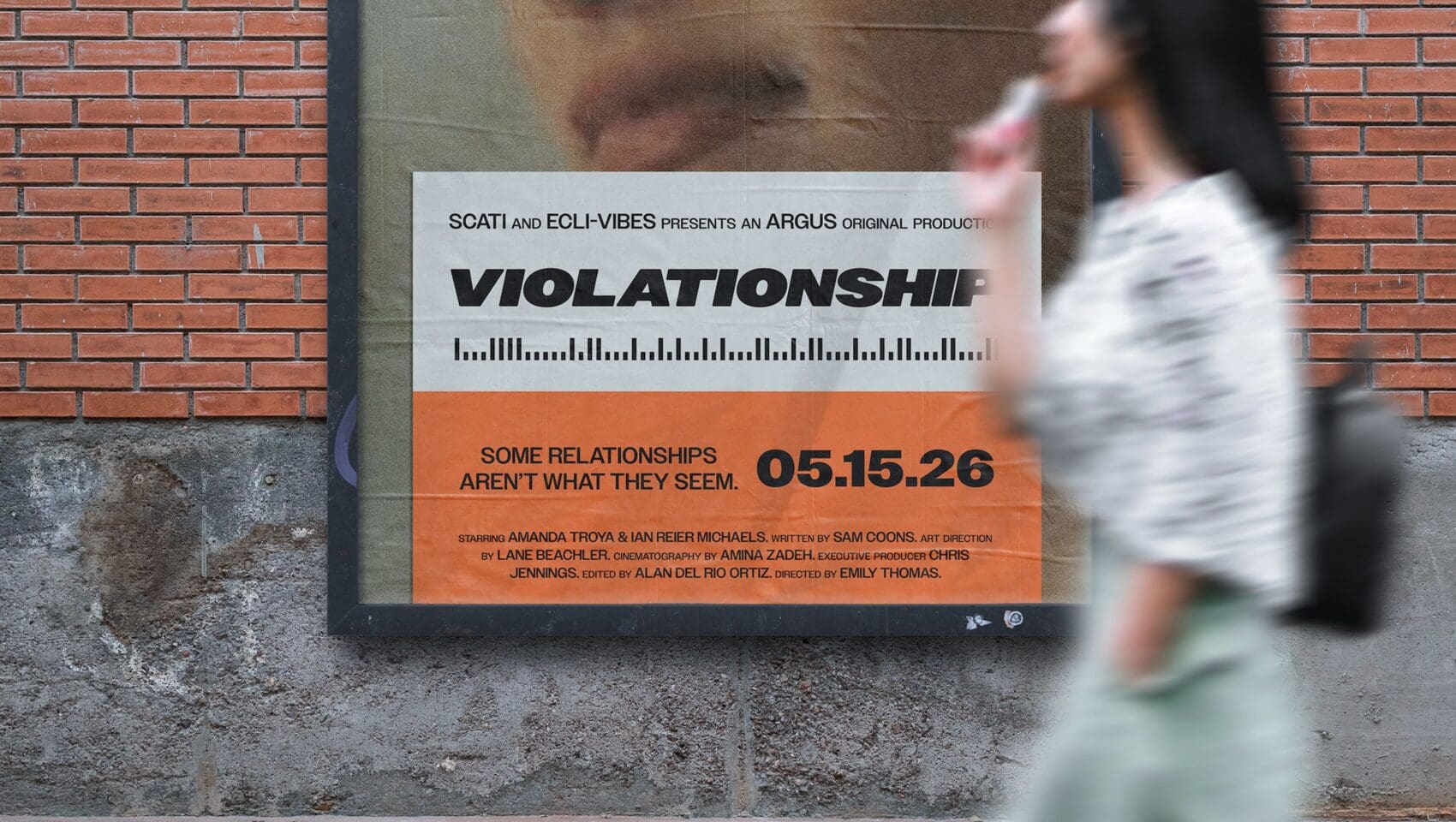 A blurred person walks past a movie poster for “ViolationShip,” which has an orange and white design and a release date of 05.15.26.